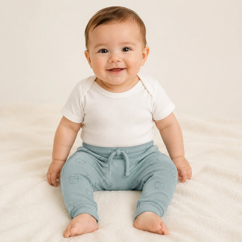 Bebê vestindo culote Saruel Suedine sem Pé Estampado na cor azul petróleo — NinaBoo ref. 5093